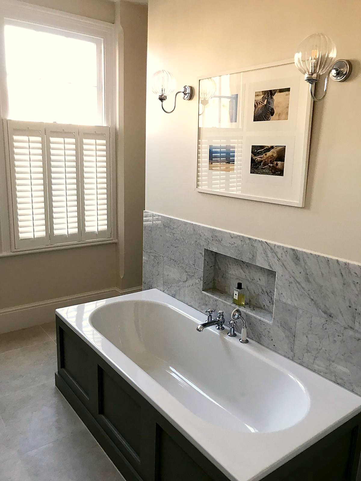 bathroom with shutters