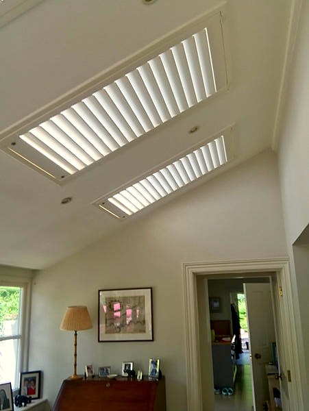 detail of a room with sky lights and shutters installed on them