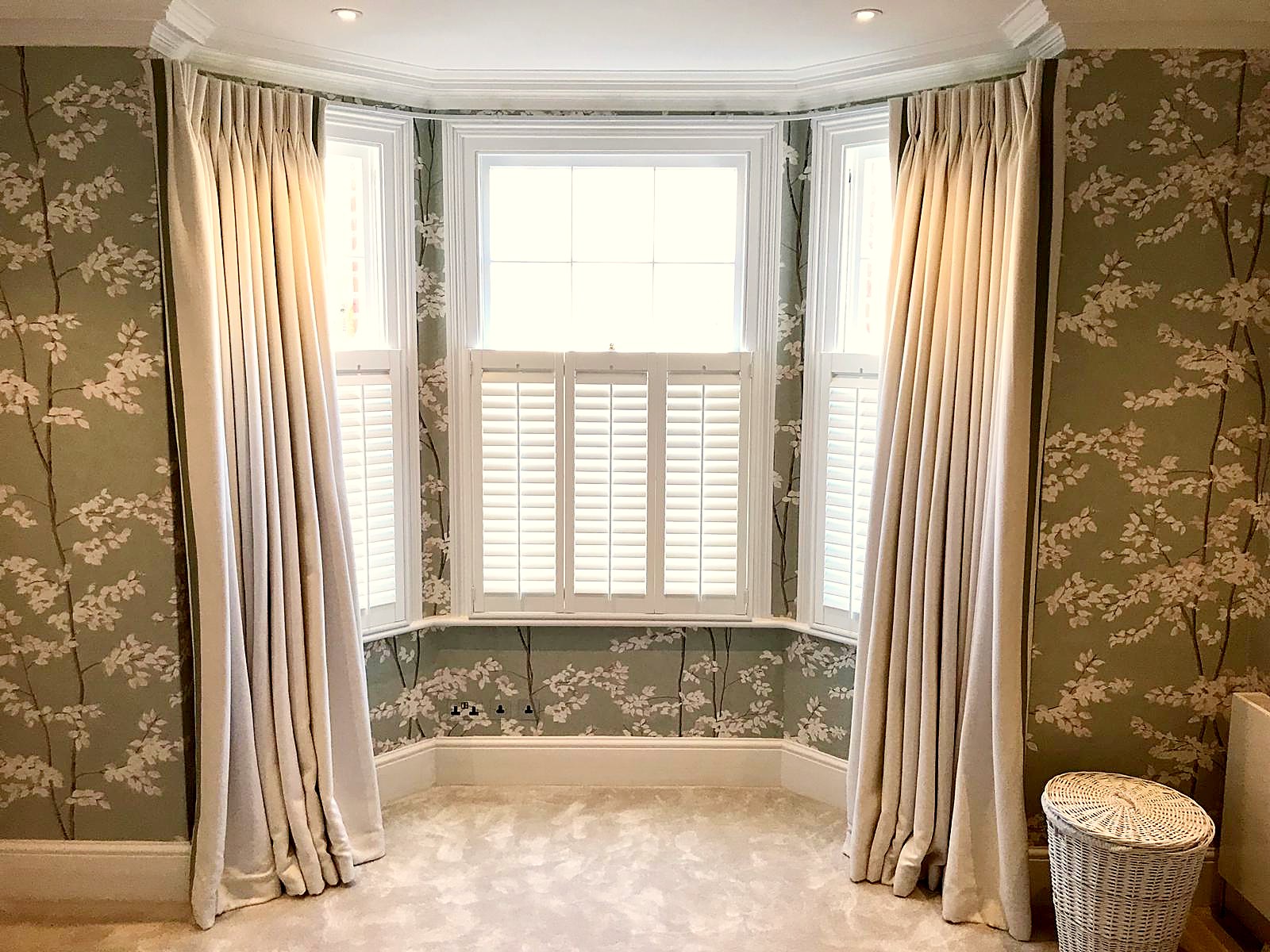 shutters in a bay window