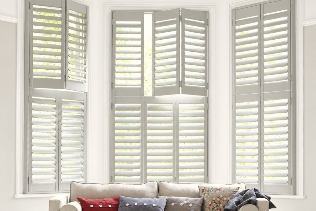 Hawaii hardwood shutters in a bedroom
