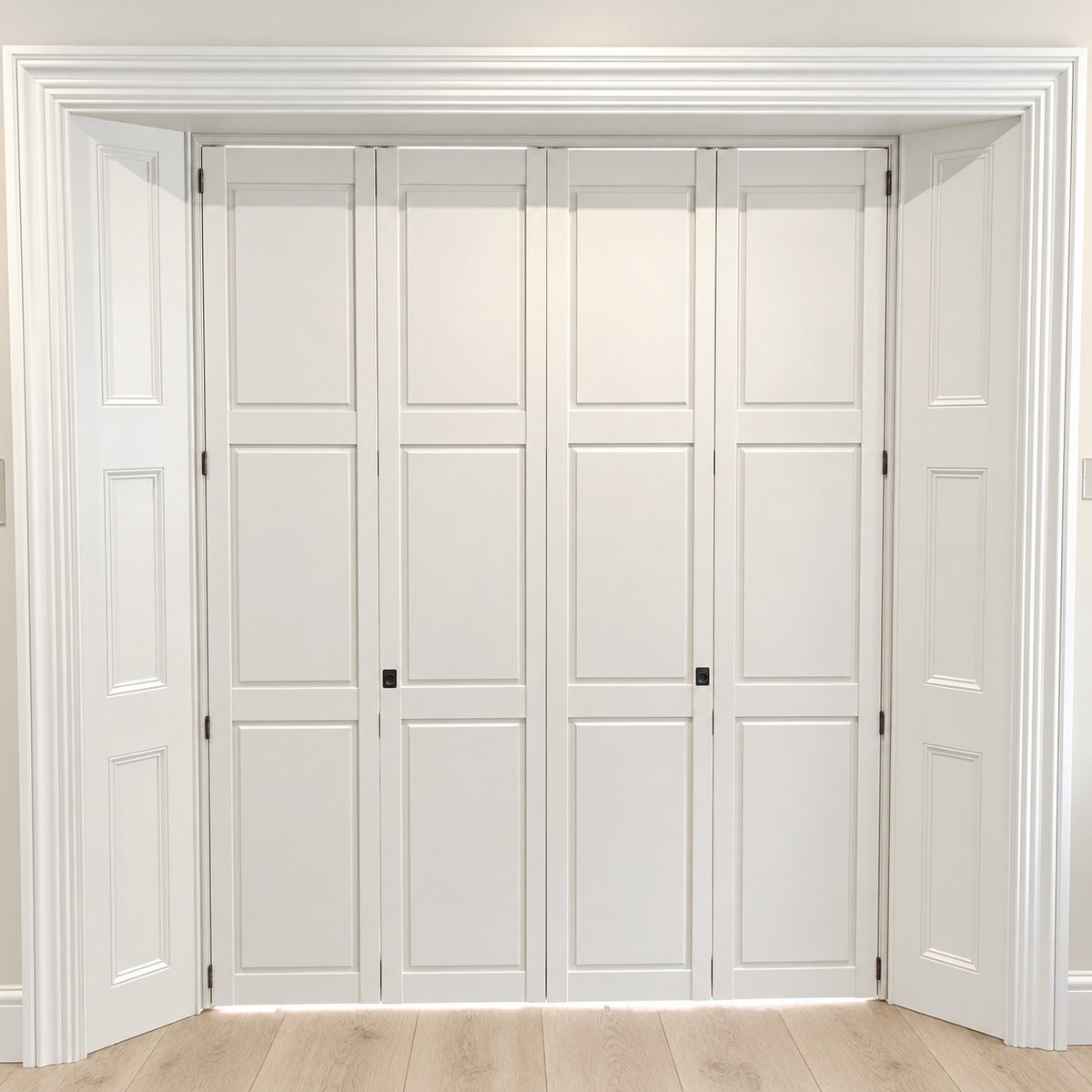 White solid panel shutters folded across a wide opening