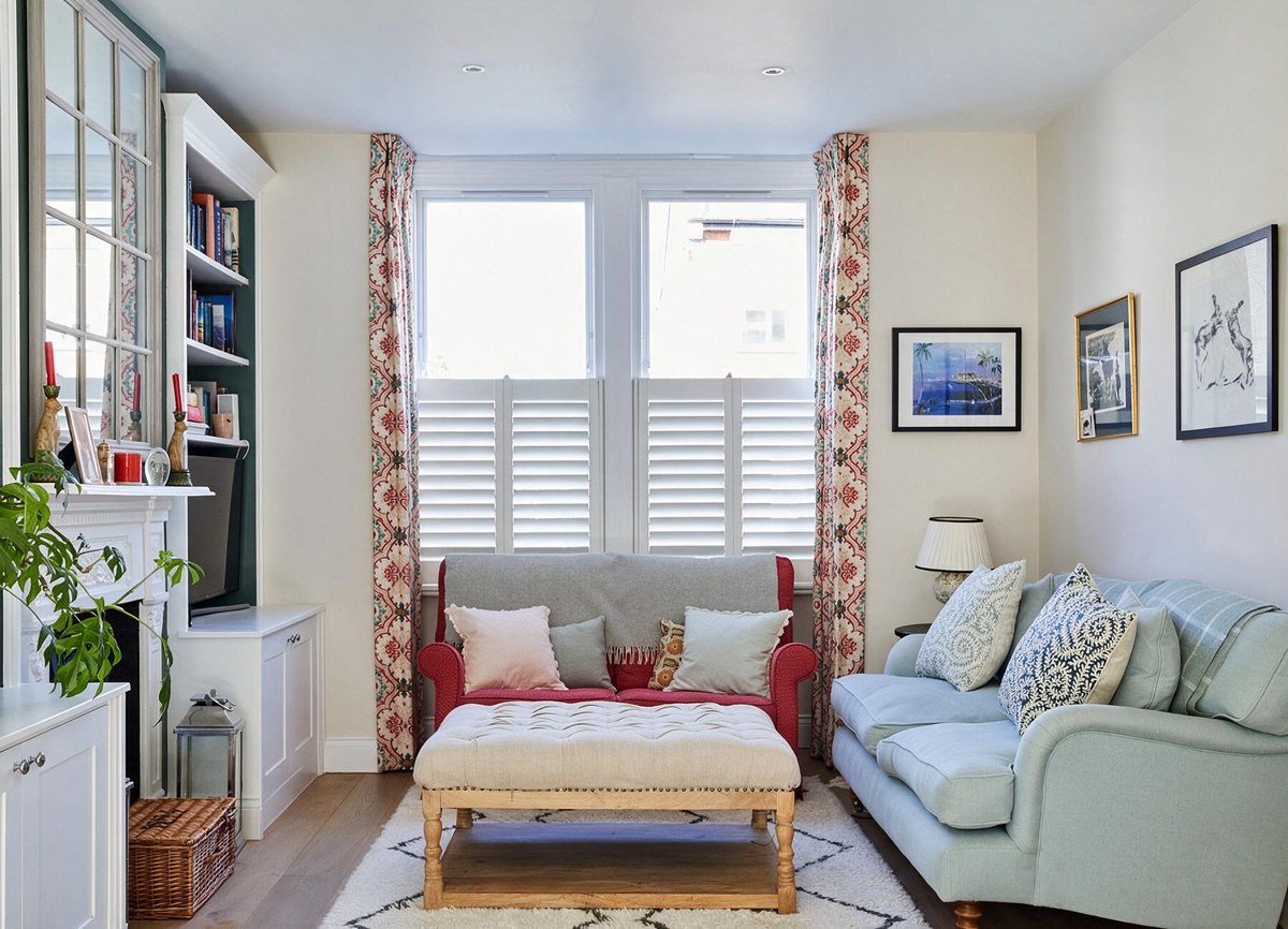 café style shutters fitted to a window in a living room