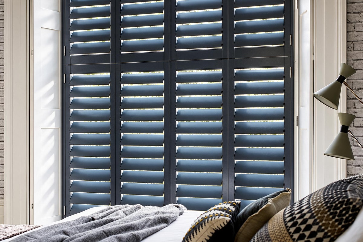 Hawaii Paulownia Full Height shutters in a bedroom