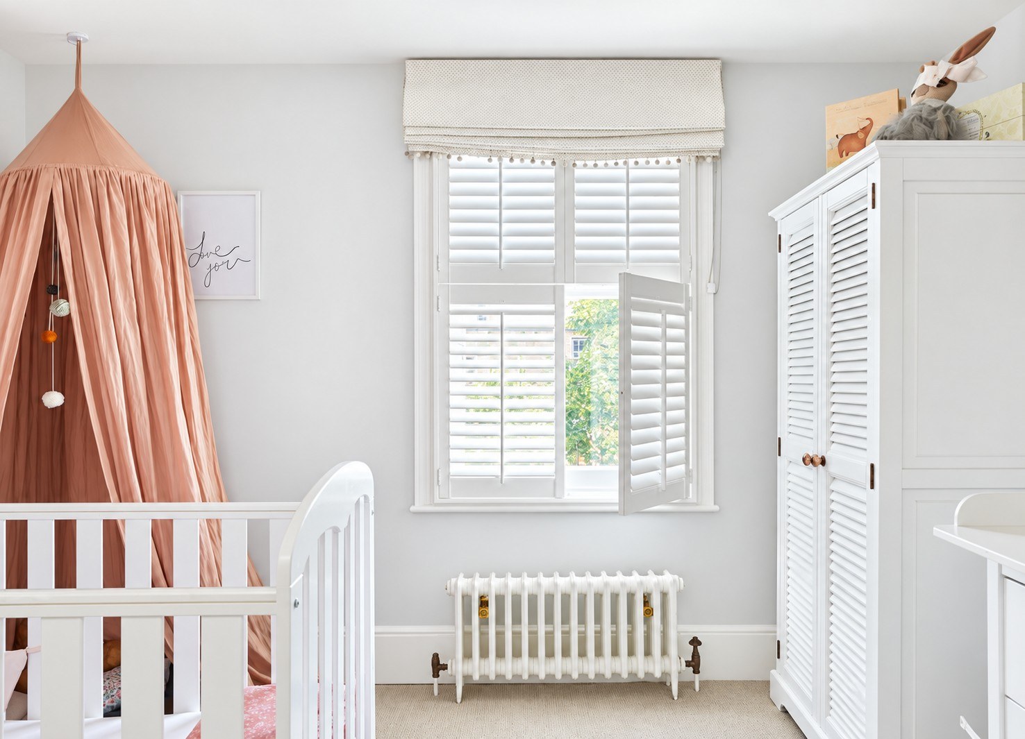 Tier-on-tier shutters fitted in a nursery