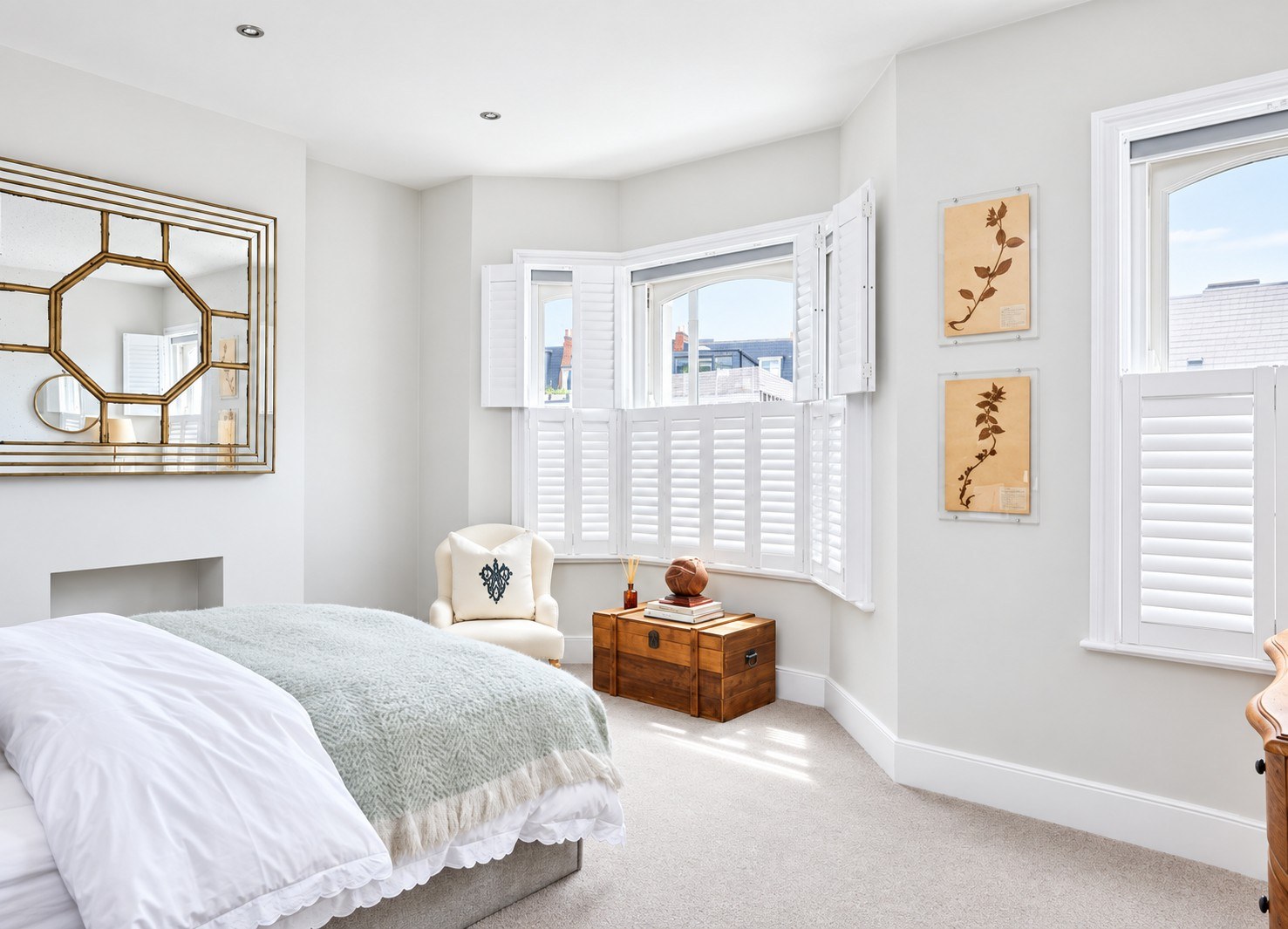 Tier on tier shutters bay window in bedroom