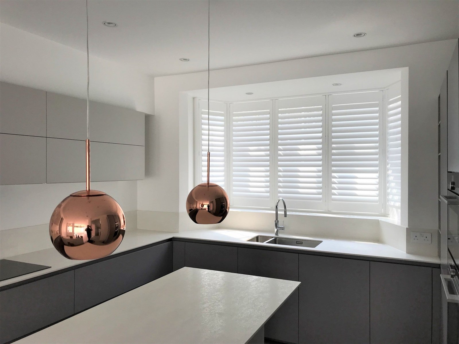 Bermuda ABS Full Height shutters fitted in a contemporary kitchen