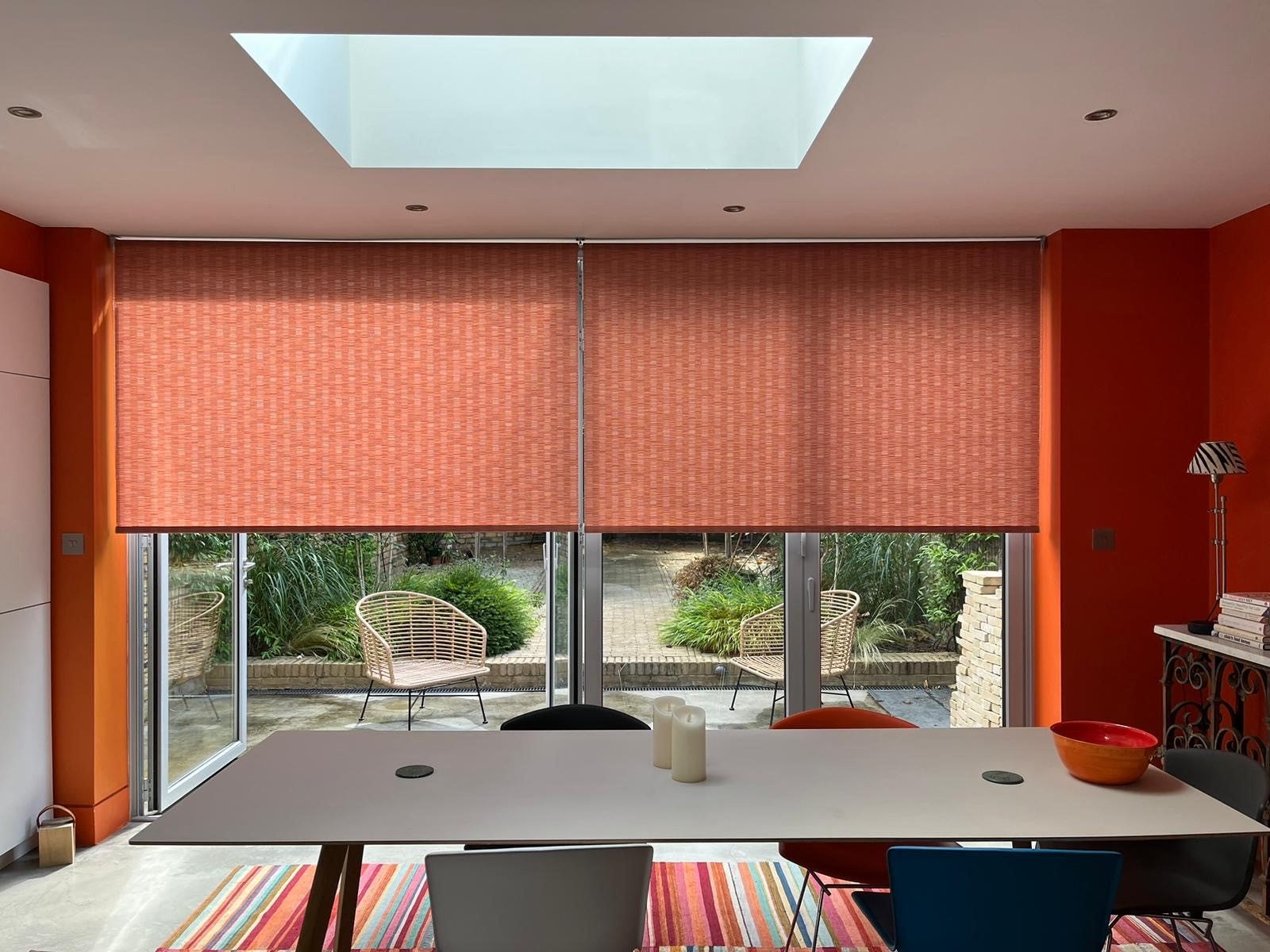 Statement roller blind fabric fitted to a glazed door