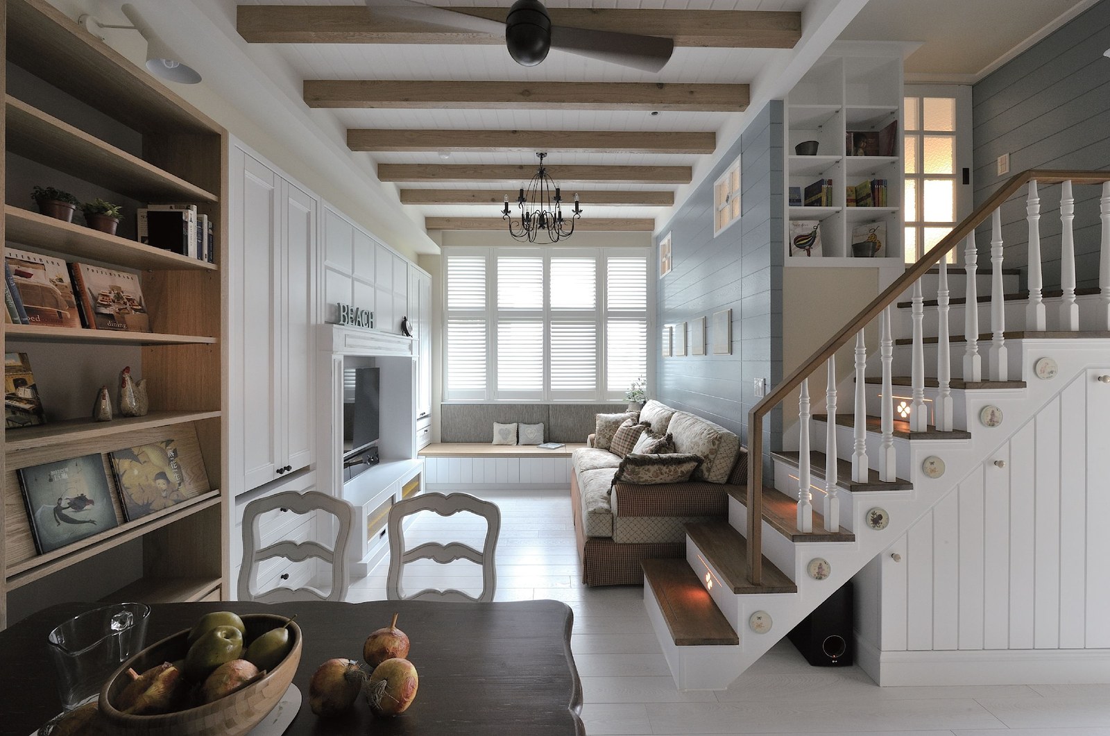 Antigua MDF Full Height shutters fitted in a bright living space