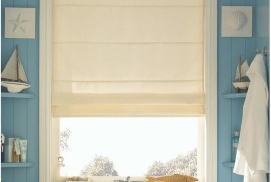 Neutral Roman blinds in a bathroom