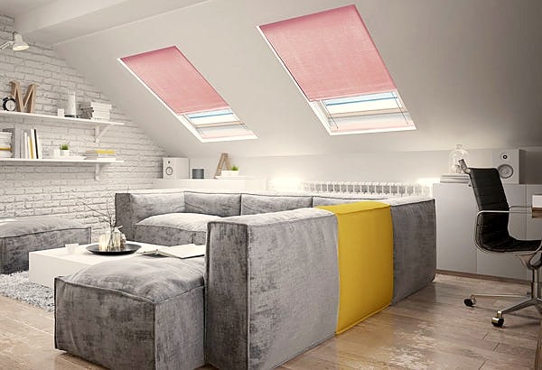 sky lights in a attic room with honeycomb blinds