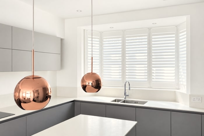 Bermuda shutters fitted in a contemporary kitchen