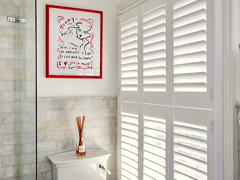 bathroom with closed shutters