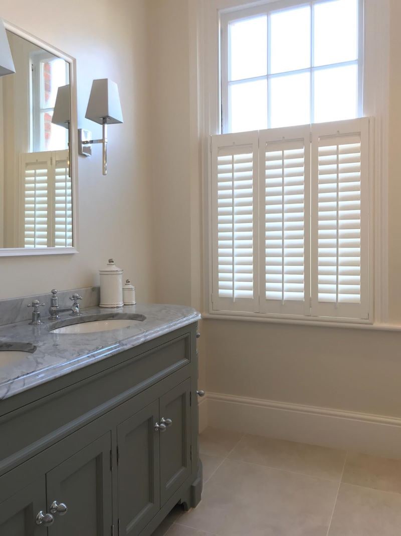 Hardwood Café Style shutters fitted to a real-home window