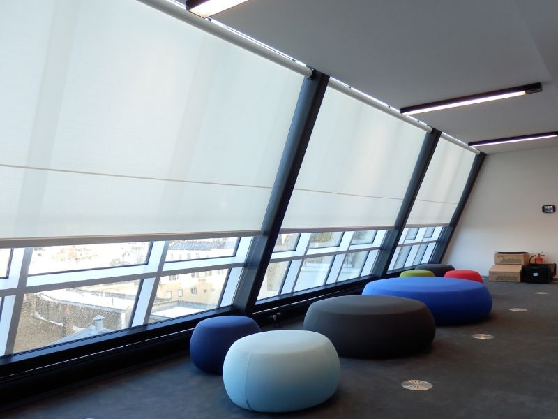 large windows with large roller blinds
