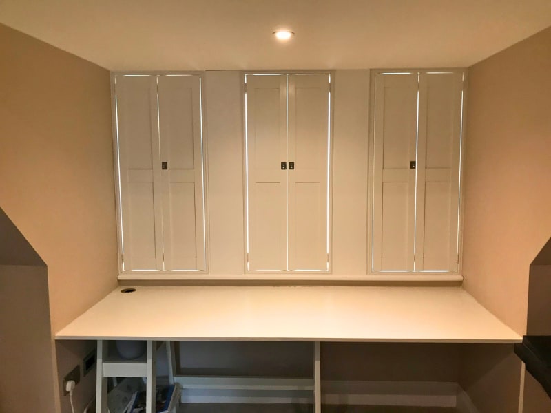 Matching Solid Shaker shutters fitted to guest bedroom windows