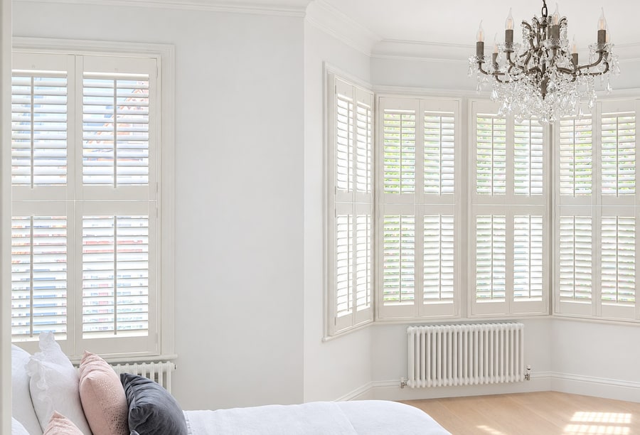 Cuba shutters in a master bedroom
