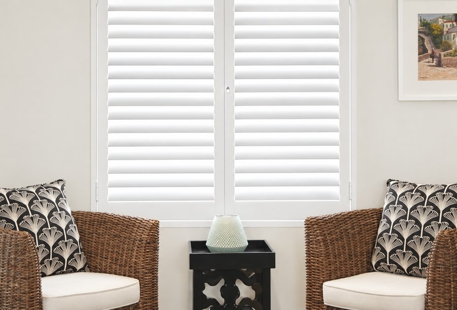 Satin White Portchester shutters in a living room