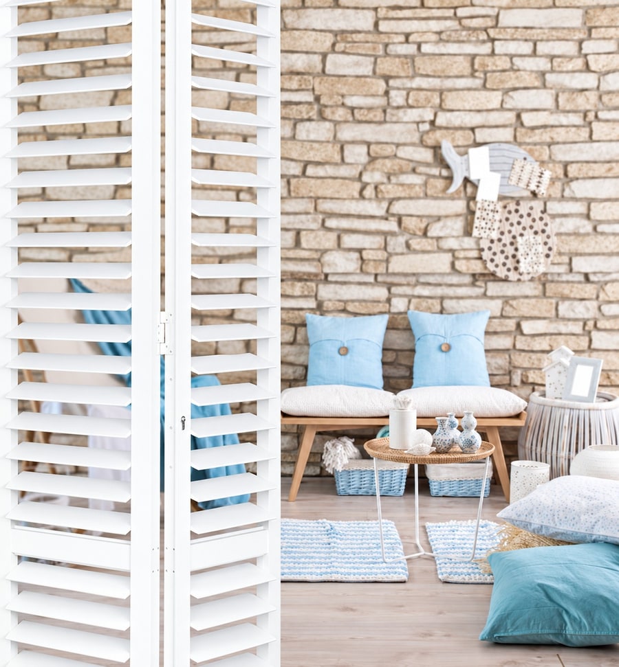 Portchester aluminium shutters in a living room